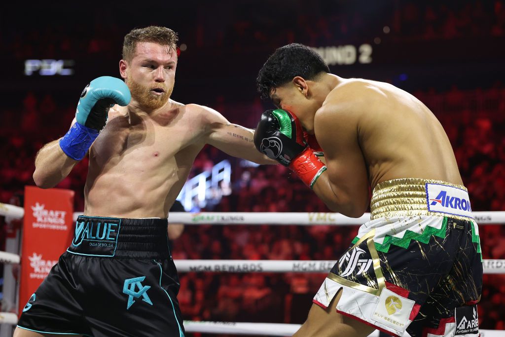  Canelo Alvarez throws a left against Jaime Munguia in their super middleweight championship title fight at T-Mobile Arena on May 04, 2024 