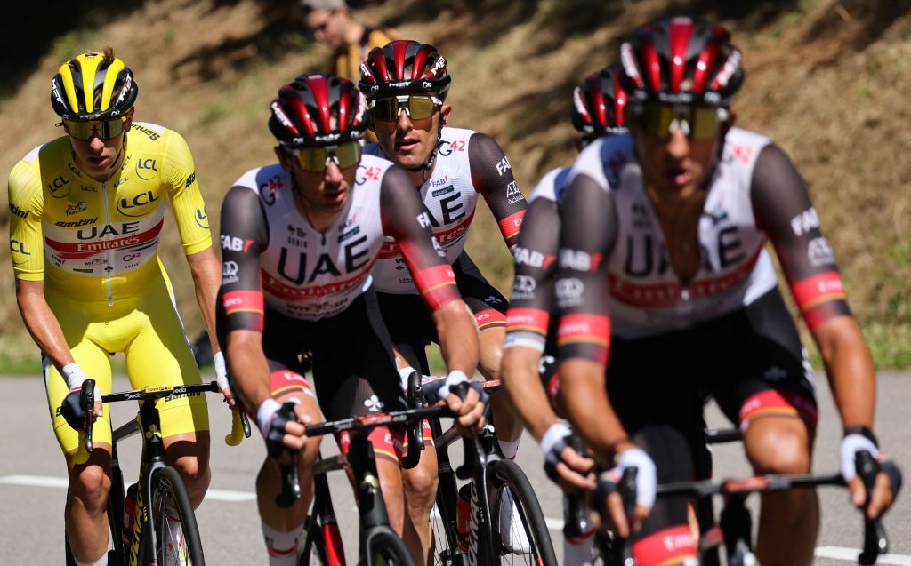 UAE Team Emirates teams Slovenian rider Tadej Pogacar wearing the overall leaders yellow jersey L cycles with his teammates during the 7th stage of the 109th edition of the Tour de France cycling race 1763 km between Tomblaine and La Super Planche des Belles Filles in eastern France on July 8 2022 Photo by Thomas SAMSON AFP Photo by THOMAS SAMSONAFP via Getty Images