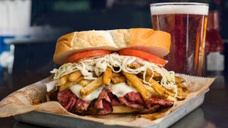 A sandwich at Primanti Bros must on your Pittsburgh foodie list