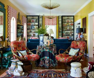 Maximalist yellow living room with vintage furniture