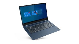 En åben Lenovo ThinkBook 14S Yoga mod en hvid baggrund.