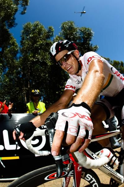 Darren Lill cracks a smile after crossing the finish line first