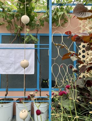 Rain chain at a bird-friendly garden at RHS Chelsea Flower Show 2022