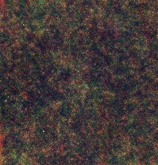 False color image of the Lockman-hole area of the sky at infrared wavelengths as imaged by the Herschel Space Observatory. The mottled effect reveals the spatial distribution of the distant starburst galaxies generating the cosmic infrared background. 
