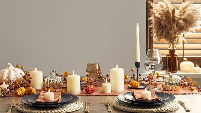 Autumnal dining table with set of TruGlow® LED Candles and Pampas grass