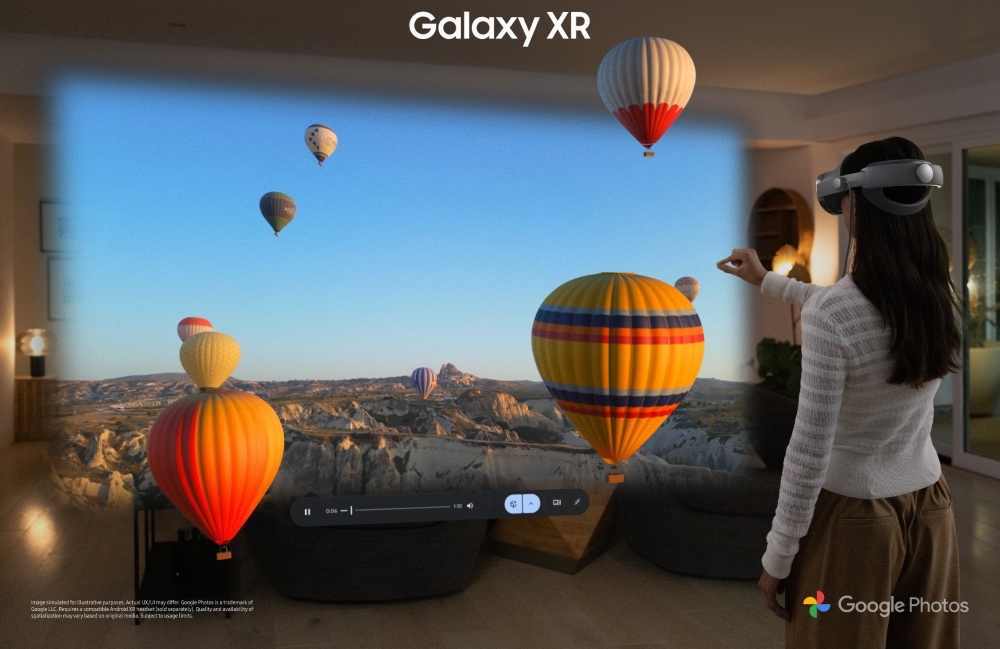 an image of a woman using Google Photos with the Samsung Galaxy XR headset
