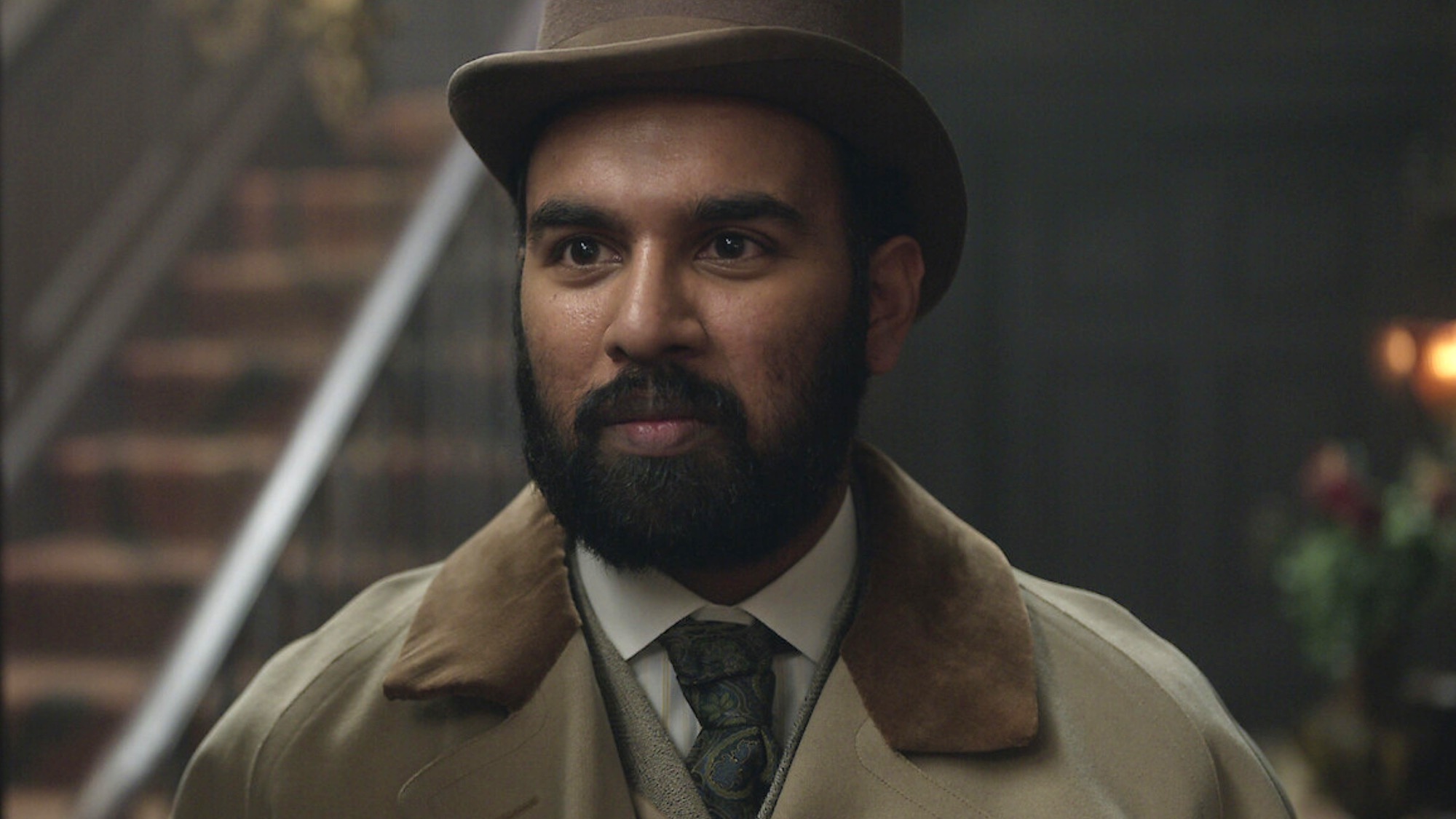 Watson smirking in Enola Holmes