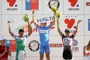 The top three celebrate on the podium