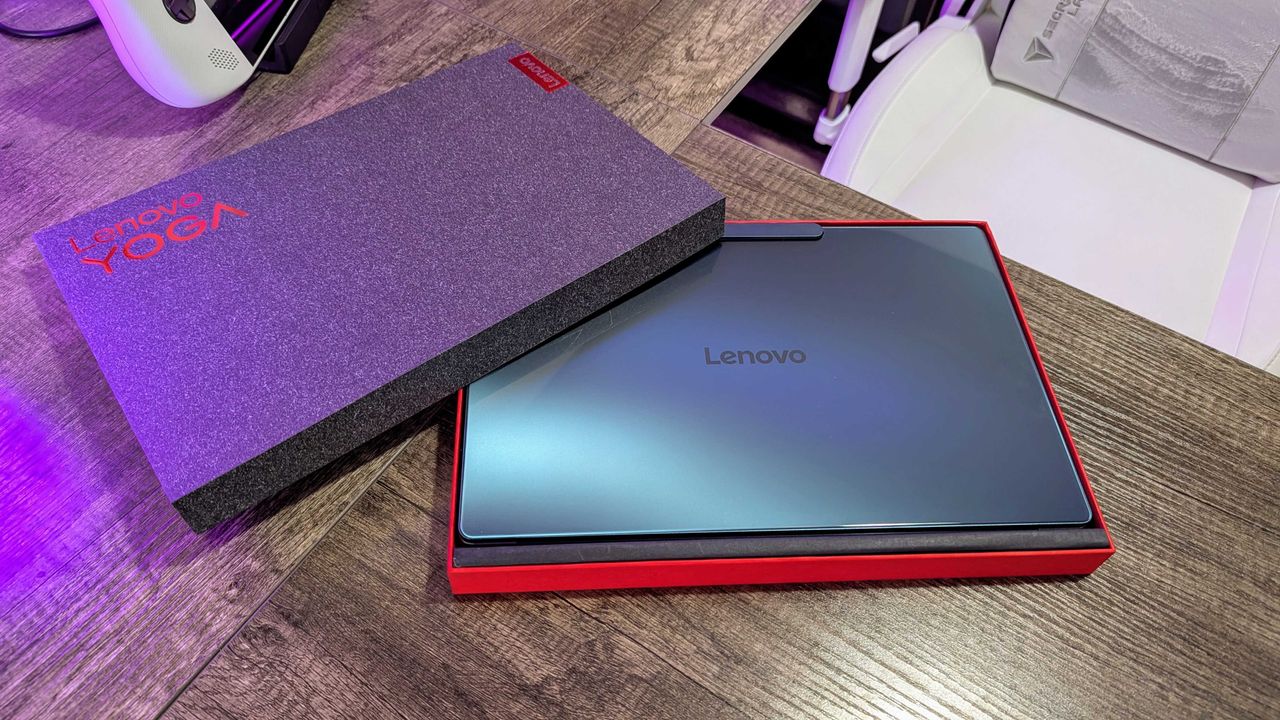 Image of the Lenovo Yoga Slim 9i 14 (Gen 10) and ASUS Zenbook A14 (2025) laptops.