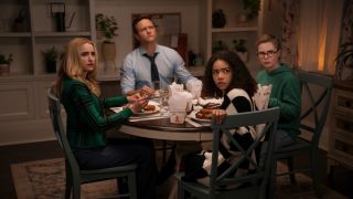 Ginny, Georgia, and the rest of their family at a dining table in Ginny & Georgia. 