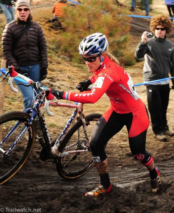 Katie Compton (Planet Bike) choosing to run on the steep pitch that Gould was riding.