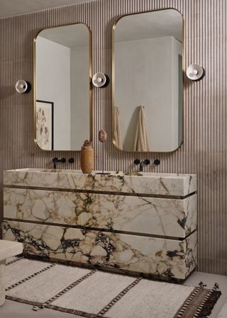 A bathroom vanity organized with drawers