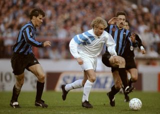 Club Brugge (in blue and black) in action against Marseille in the Champions League in April 1993.