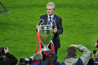 Jupp Heynckes poses with the Champions League trophy after Bayern Munich's win over Borussia Dortmund in the final in May 2013.