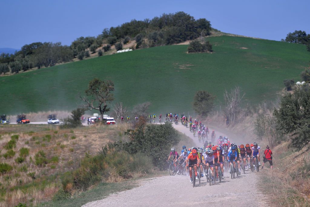 ARCIDOSSO ITALY SEPTEMBER 12 Amanda Spratt of Australia and Team Mitchelton Scott Marianne Vos of The Netherlands and Team CCC Liv Katarzyna Niewiadoma of Poland and Team Canyon SRAM Racing Omer Shapira of Israel and Team Canyon SRAM Racing Peloton Landscape Dust during the 31st Giro dItalia Internazionale Femminile 2020 Stage 2 a 1248km stage from Civitella Paganico to Arcidosso GiroRosaIccrea GiroRosa on September 12 2020 in Arcidosso Italy Photo by Luc ClaessenGetty Images