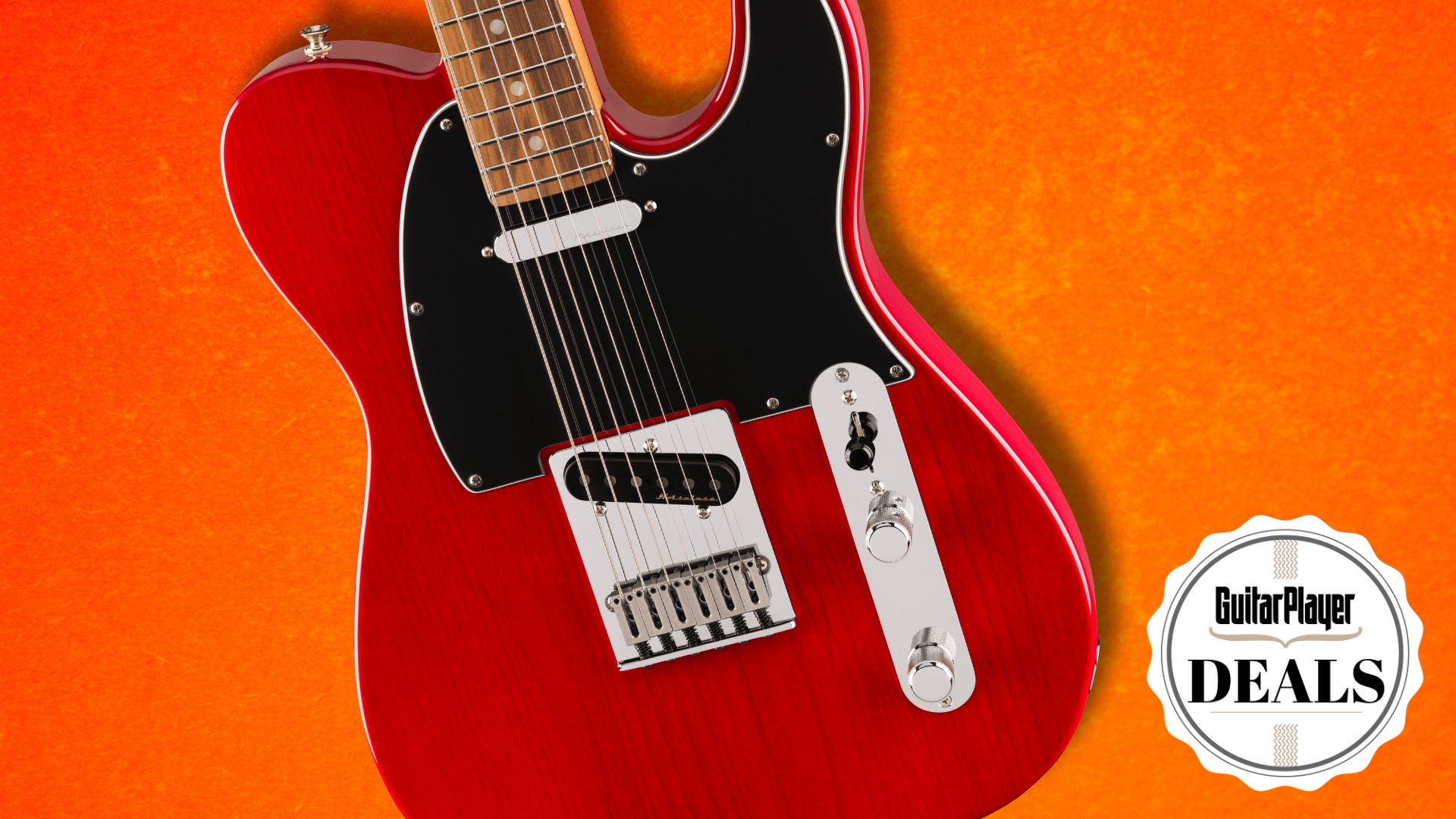 A Fender Player Plus Telecaster on an orange background