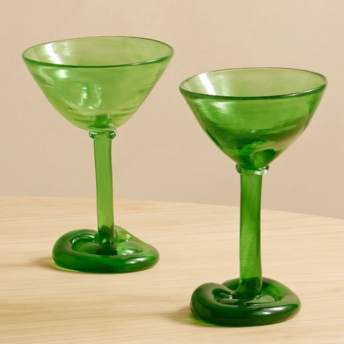 Two bottle green cocktail glasses