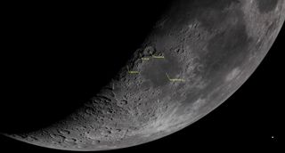 A close up view of the moon with craters near is shaded edge labeled in yellow.