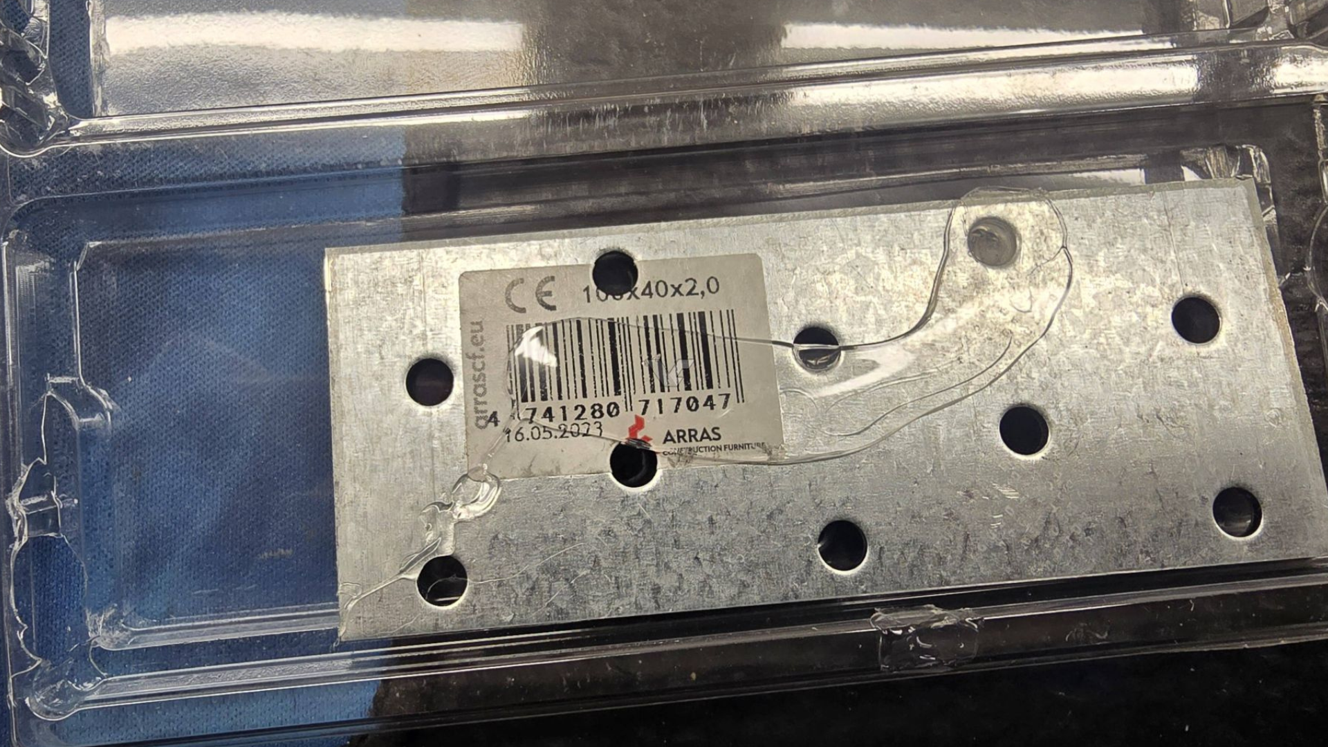 A DDR5 package shipped with metal ballast plate to fake its weight. 