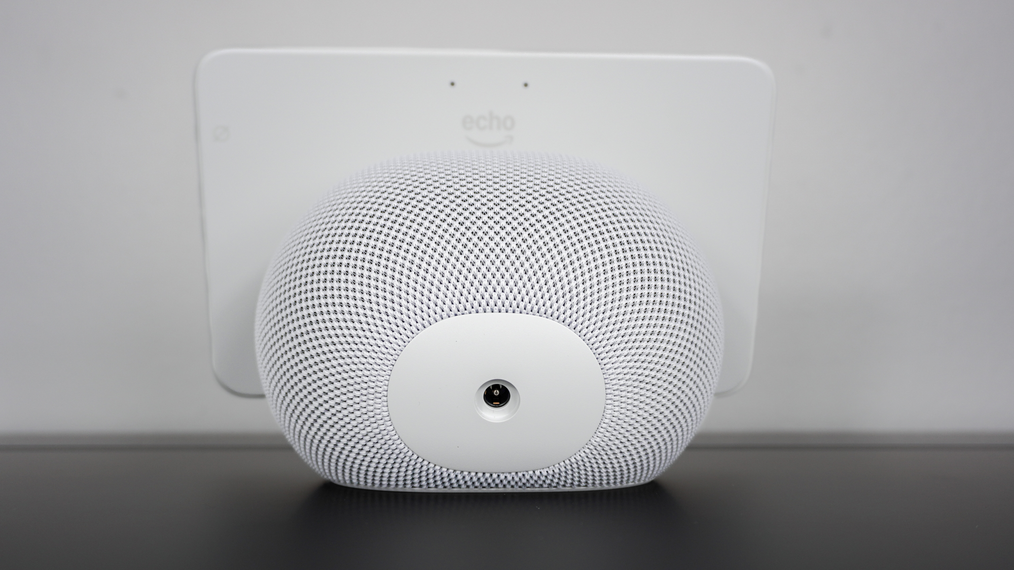 The backside of the Echo Show 8 (4th Gen) showing of its barrel port power connector