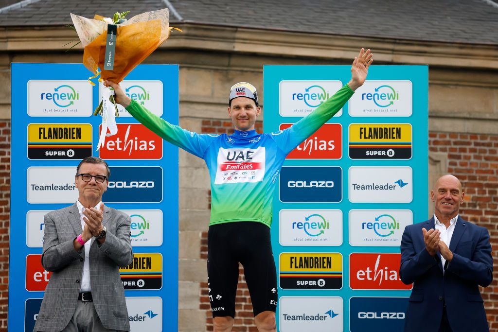 WINTERBERG GERMANY AUGUST 25 Tim Wellens of Belgium and UAE Team Emirates celebrates at podium as Blue Leader Jersey winner during the 19th Renewi Tour 2023 Stage 3 a 1712km stage from Aalter to Geraardsbergen UCIWT on August 25 2023 in Geraardsbergen Belgium Photo by Christian KasparBartkeGetty Images
