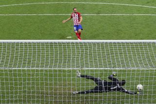 Real Madrid goalkeeper Keylor Navas saves a penalty from Atletico Madrid's Juanfran in the shootout in the 2016 Champions League final.