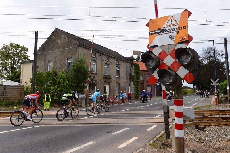 Warning signs for riders contemplating crossing when the barriers are down