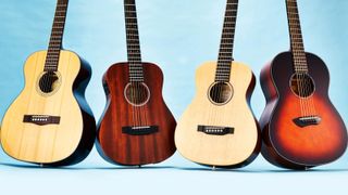 A collection of 3/4 acoustic guitars on a blue background