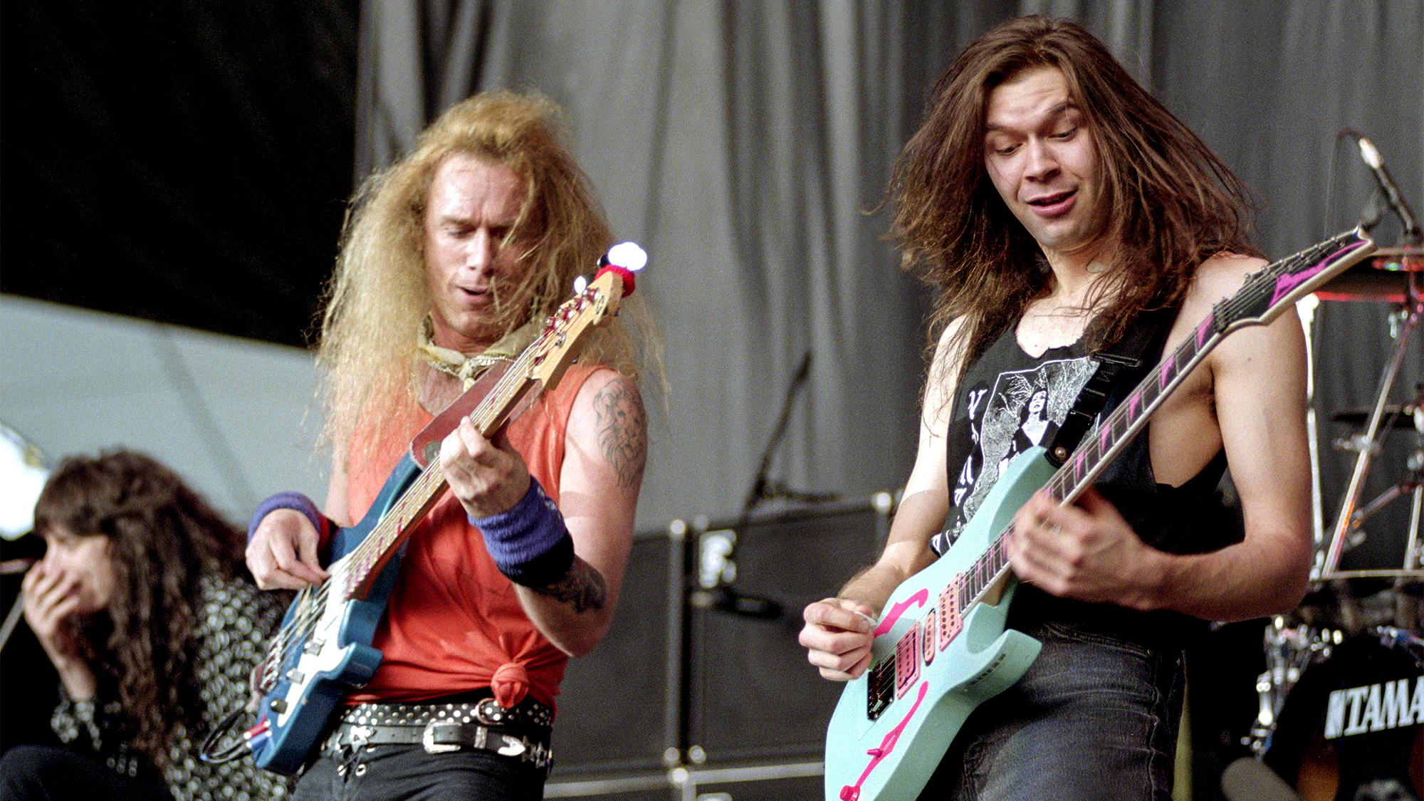 Billy Sheehan (L) and Paul Gilbert of Mr. Big perform at Shoreline Amphitheatre on May 31, 1982 in Mountain View, California.