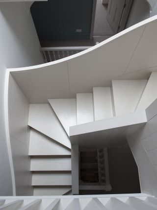 Loft conversion stairs by Inglis Badrashi Loddo