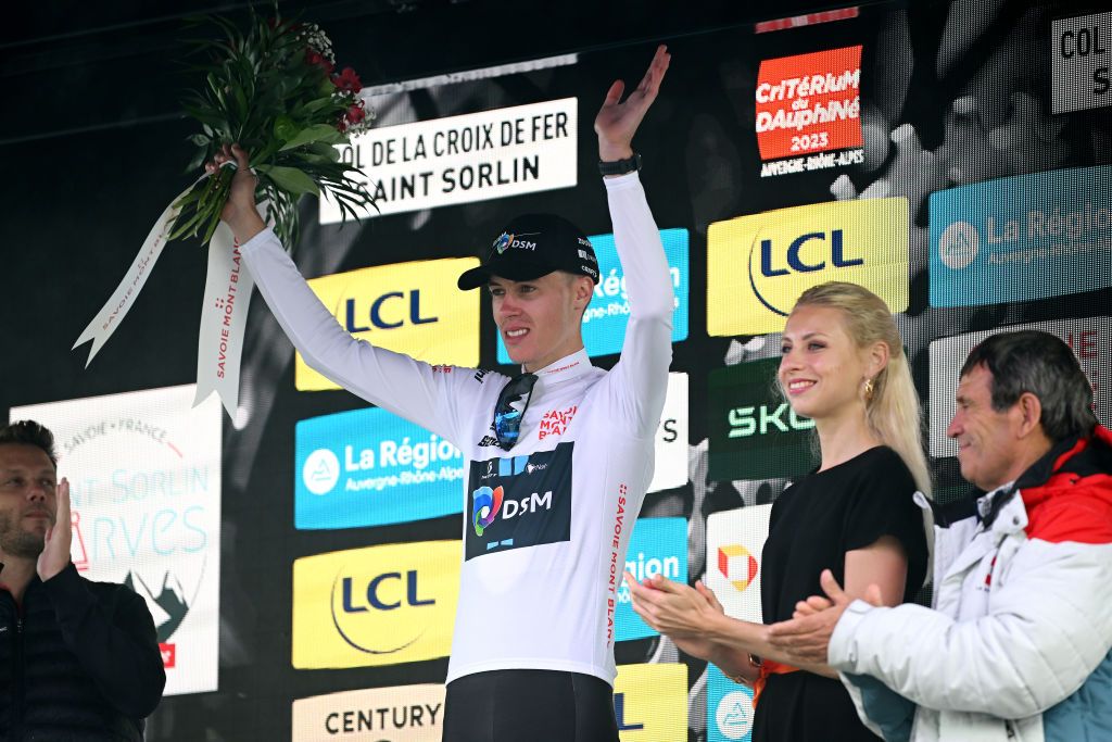 COL DE LA CROIX DE FER FRANCE JUNE 10 Max Poole of The United Kingdom and Team DSM celebrates at podium as White Best Young Rider Jersey winner during the 75th Criterium du Dauphine 2023 Stage 7 a 1479km stage from PortedeSavoie to Col de la Croix de Fer 2067m UCIWT on June 10 2023 in Col de la Croix de Fer France Photo by Dario BelingheriGetty Images
