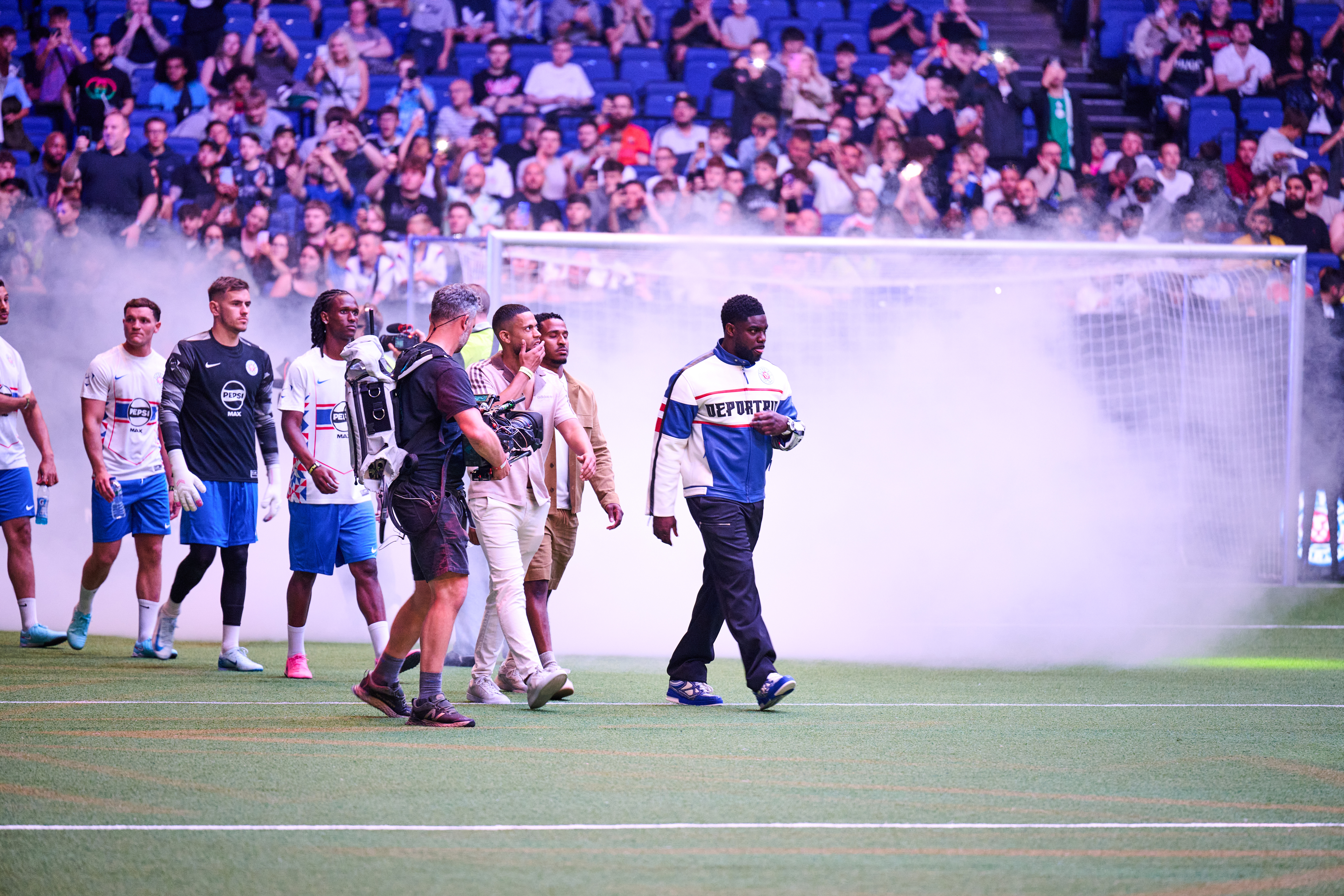 LONDON, ENGLAND - JUNE 12: Micah Richards walks on during "Baller League UK - 2025 Final" at the 02 Arena on June 12, 2025 in London, England. (Photo by Jordan Peck/Getty Images)