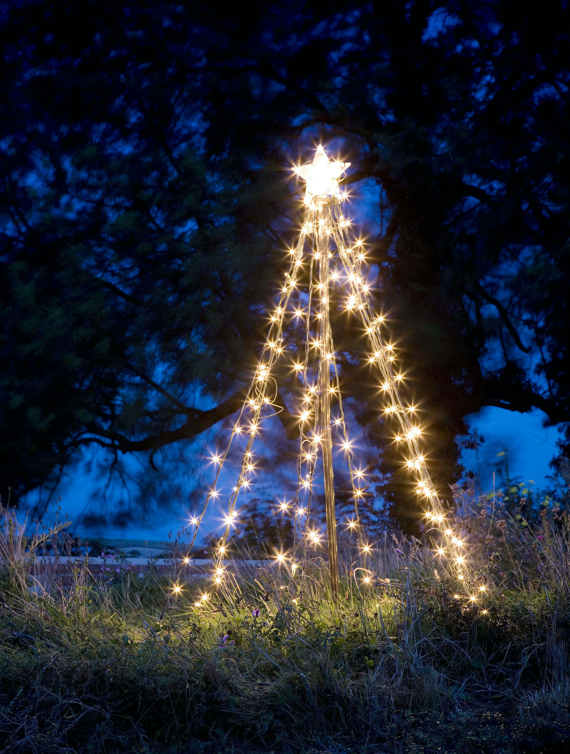 outdoor christmas tree made from fairy lights
