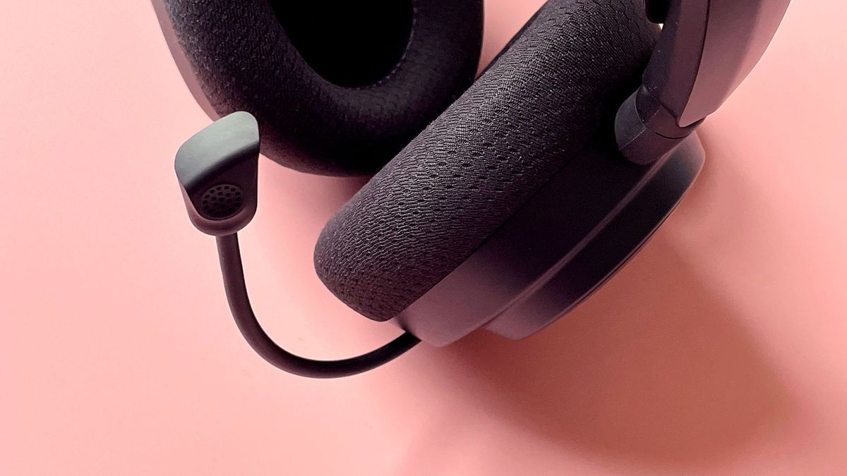 The SteelSeries Arctis Nova 7 Wireless on a pink background.