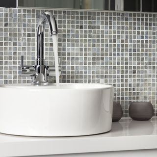 ceramic washbasin with silver tap