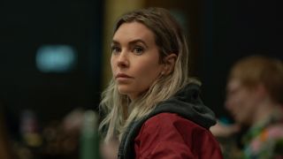 Lynette in red jacket in Night Always Comes