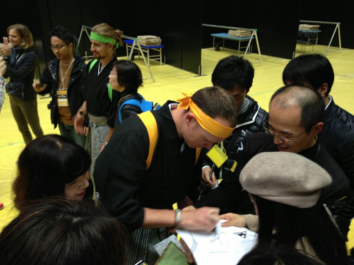 Chris Froome signs some autographs