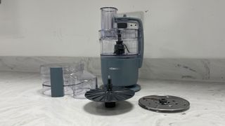 Kenwood MultiPro Go Food Processor on the counter with its accessories