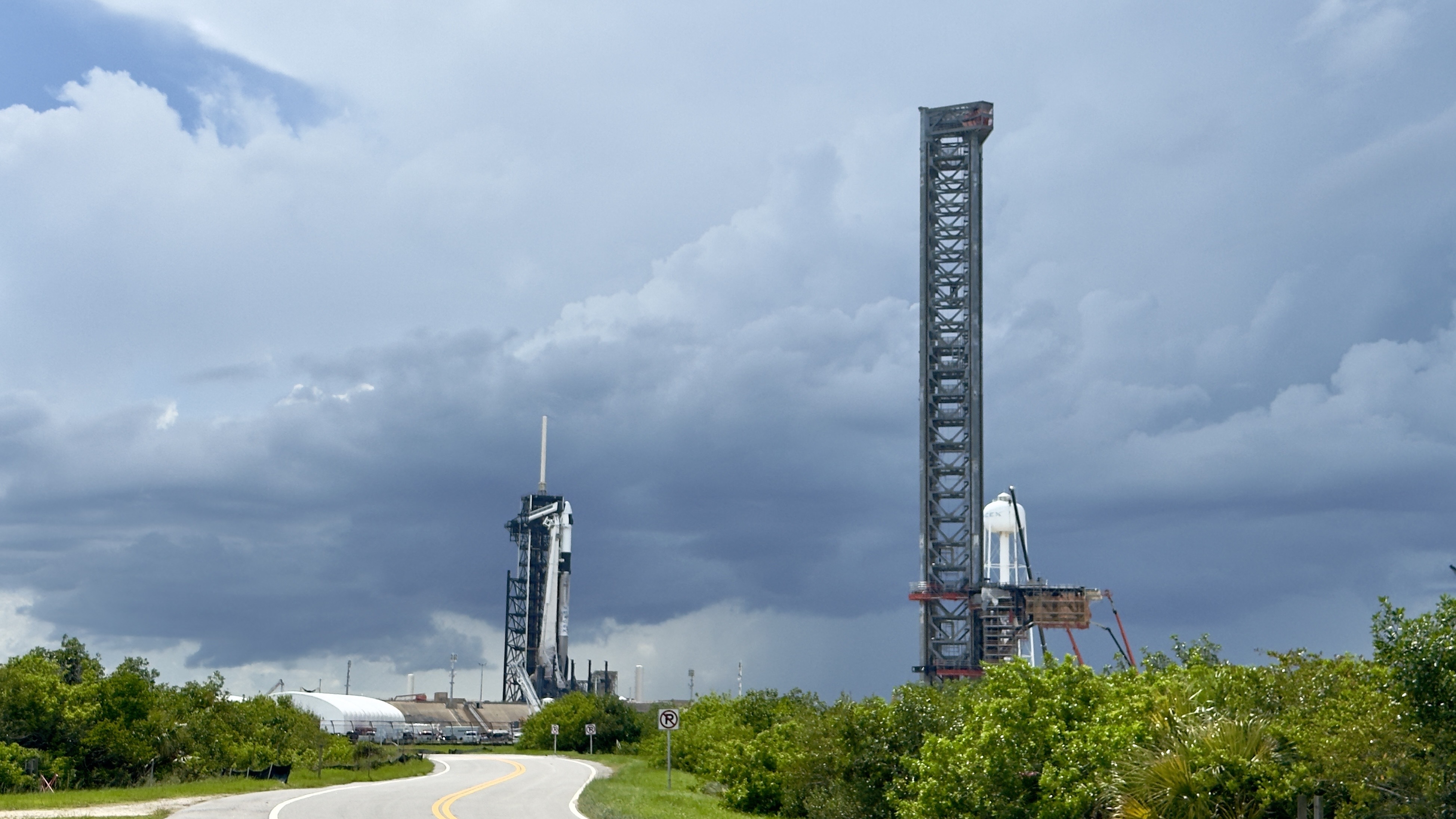 Two rocket towers stand next to each other.