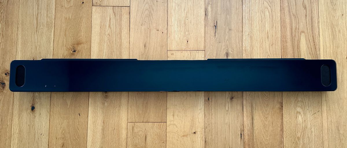 Bose Smart Ultra Soundbar on a wooden surface