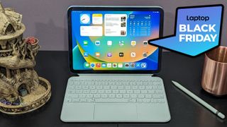 Apple iPad 10 with keyboard and Apple Pencil on a table