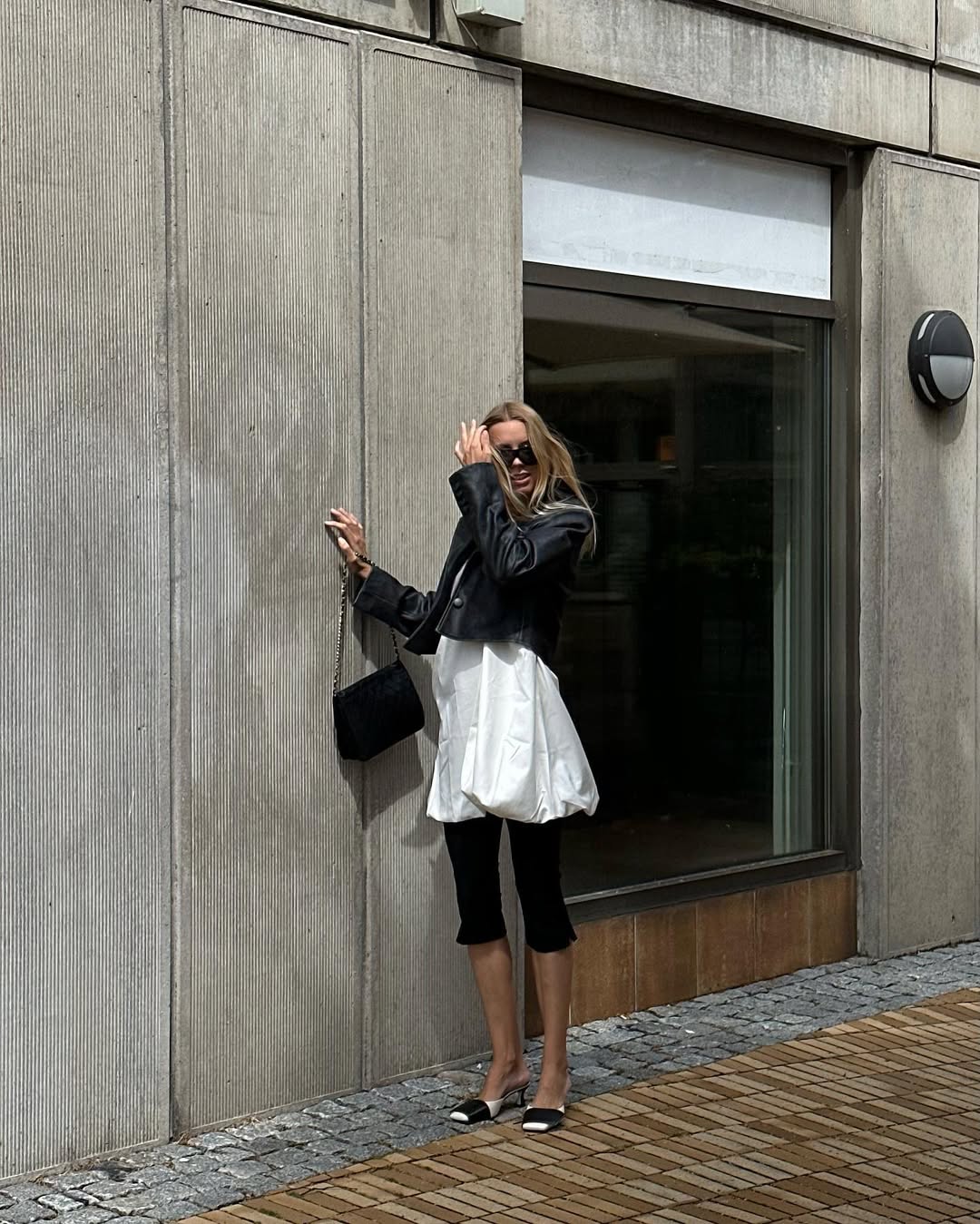 Controversial fashion trends 2025: bubble hem skirt over capri pants