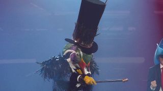 The Mallard pointing his cane The Masked Singer