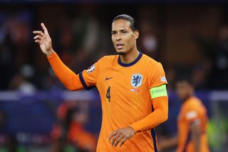 Netherlands Euro 2024 squad Liverpool Virgil van Dijk of the Netherlands gestures during the UEFA EURO 2024 quarter-final match between Netherlands and Türkiye at Olympiastadion on July 06, 2024 in Berlin, Germany. (Photo by Alex Grimm/Getty Images)