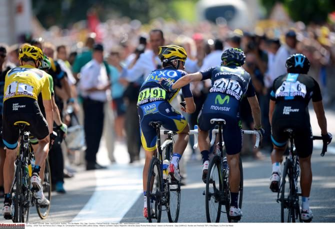 Alberto Contador and Alejandro Valverde chat after finishing stage 16 while Chris Froome looks on
