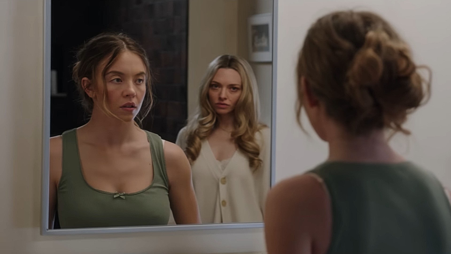 Sydney Sweeney as Millie and Amanda Seyfried as Nina in The Housemaid
