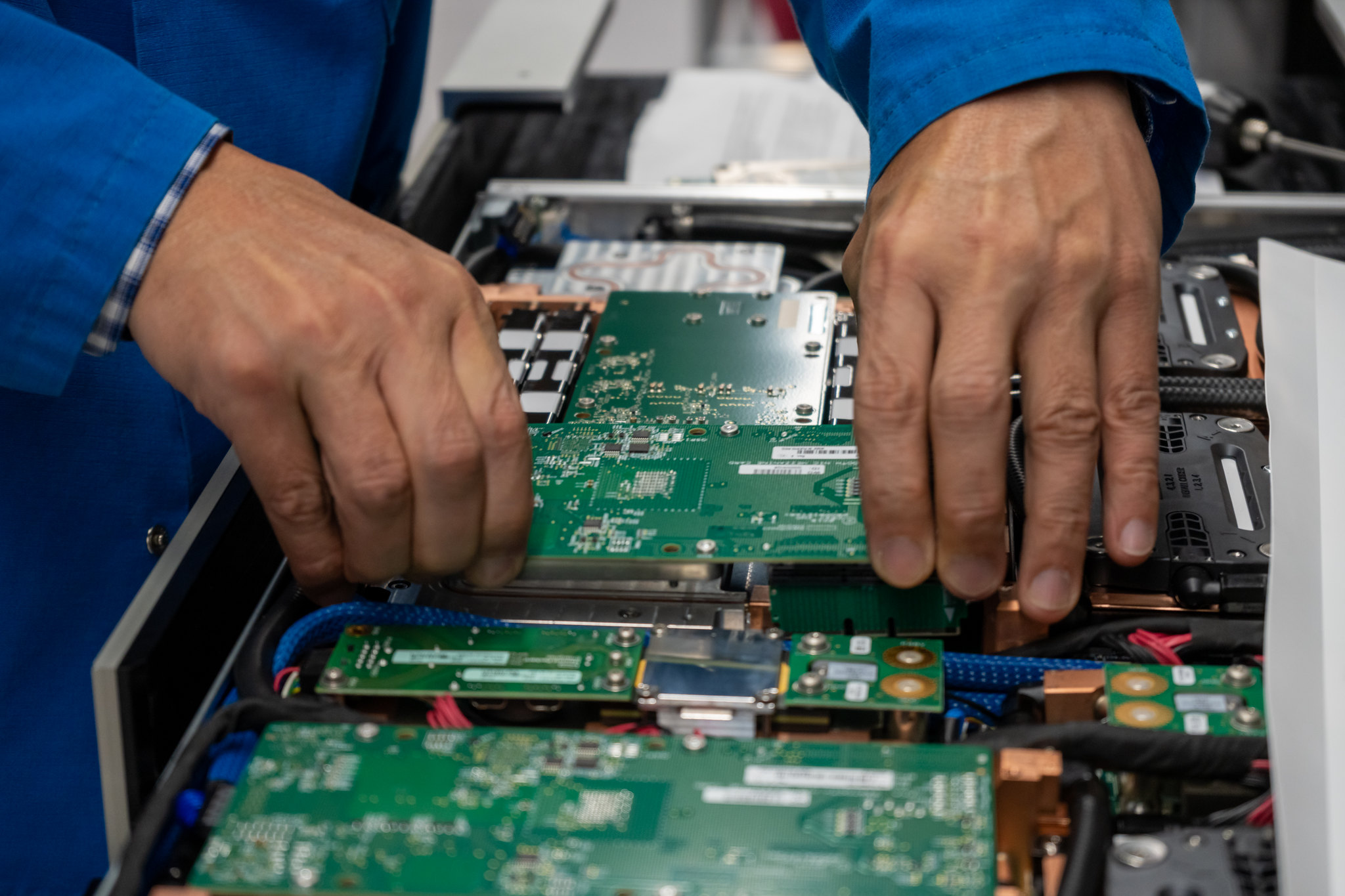 Lab technician working on Frontier compute node