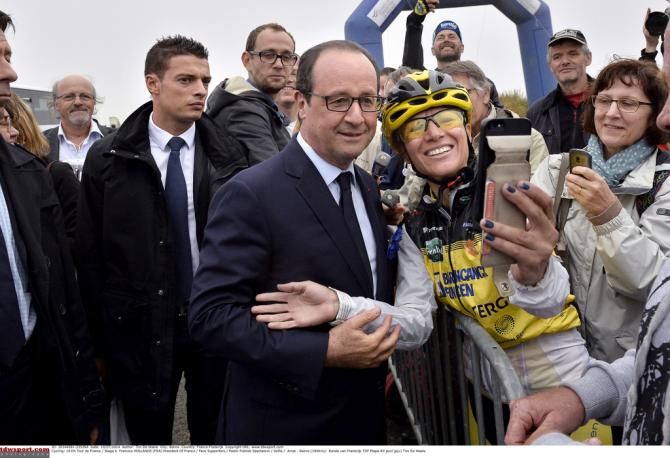 French president Fran&ccedil;ois Hollande gets a selfie with a fan