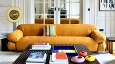 a sesann sofa in bright yellow in a modern living room