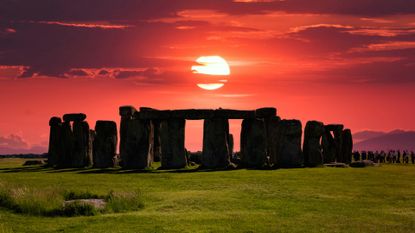 Summer Solstice 2023: Stonehenge silhouette at sunset on winter solstice.